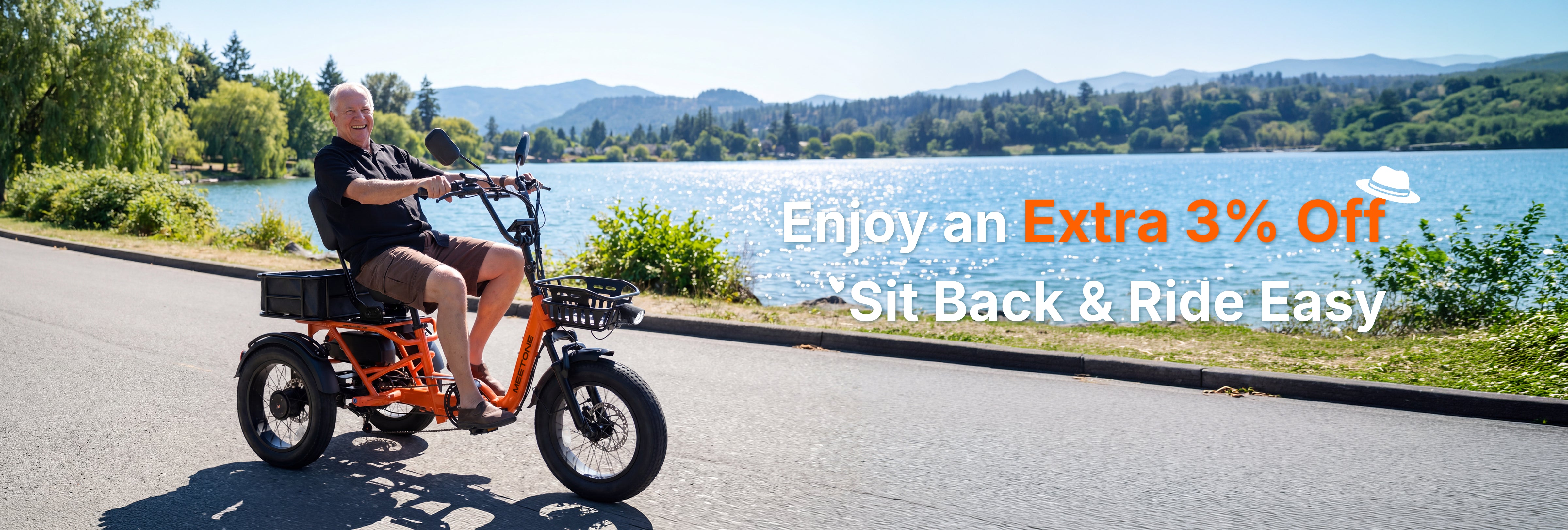 An Old Man riding a Breeze Pro 2.0 electric trike by the lake.